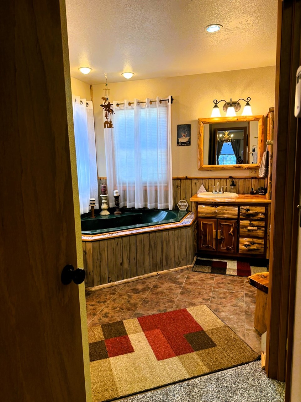 entry into the five piece primary bath and walk-in closet