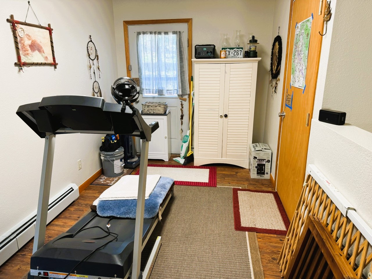 just beyond the kitchen and living room is a bonus room