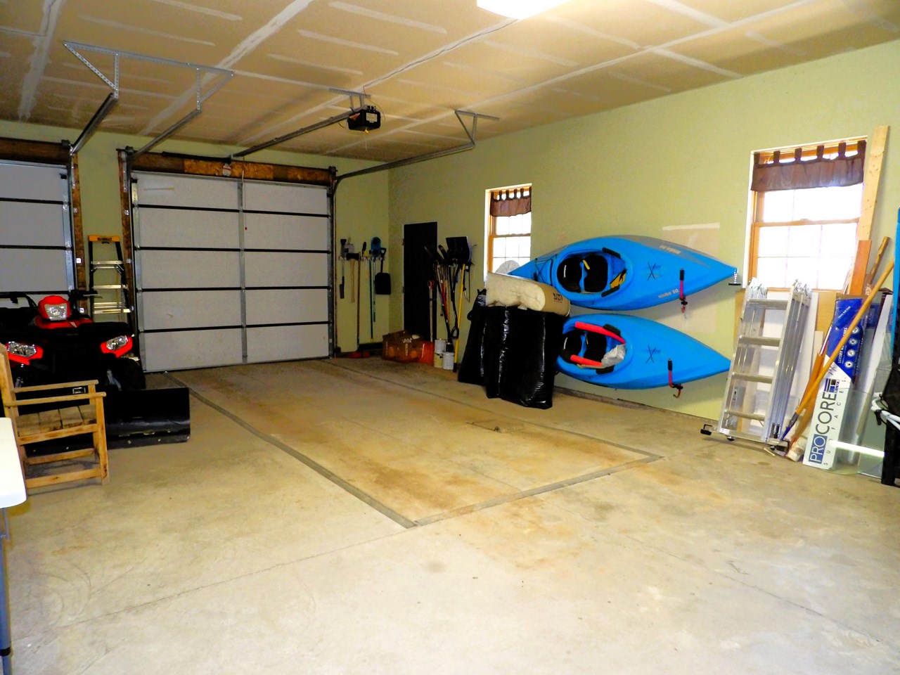 oversized garage - 896 sqft - room for two, maybe three small cars, storage and a workshop
