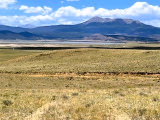 a zoomed view from the top of the property over the lot and antero reservoir to buffalo peaks