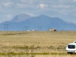 zoomed view west from the property to buffalo peaks that are obscured due to smoke from canada