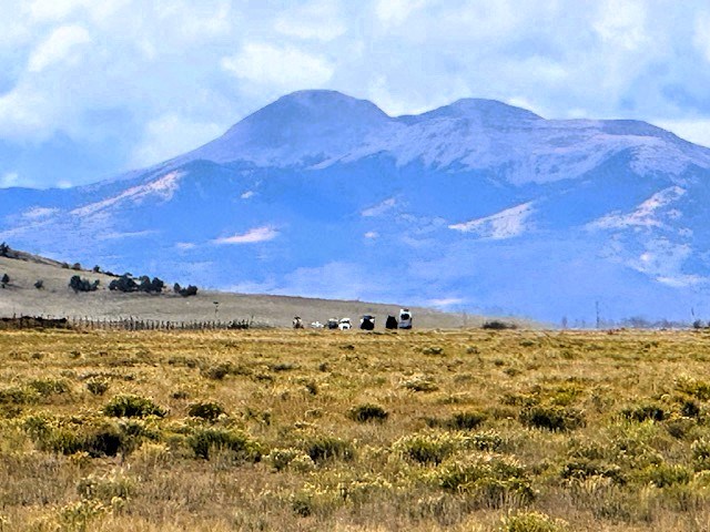 zoomed view west to buffalo peaks with large groves of golden aspens flowing down the mountain sides