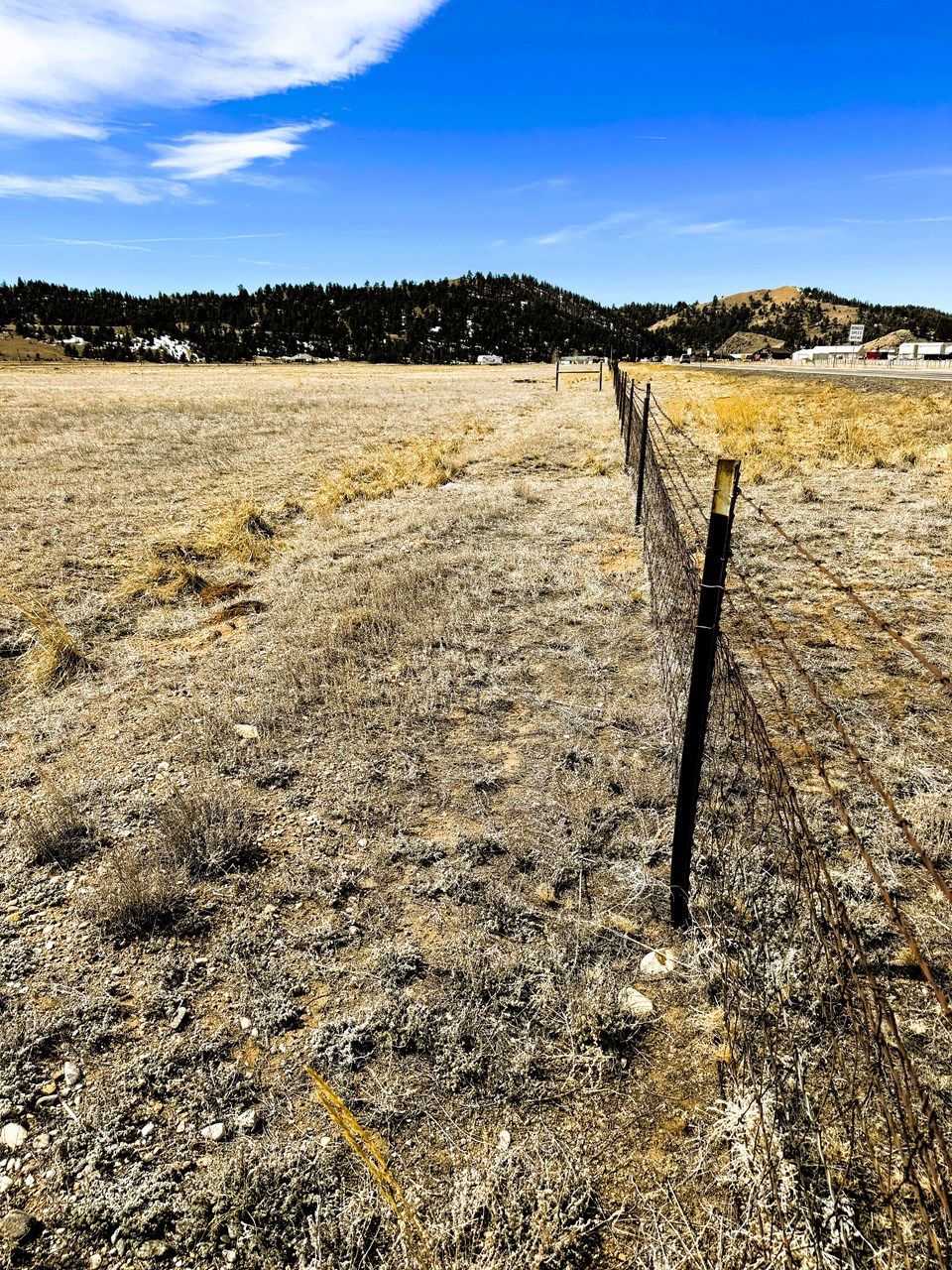 view southwest toward hartsel from the lot's northeast corner along the north fence line and us24e view southwest toward hartsel from the lot's northeast corner along the north fence line and us24e