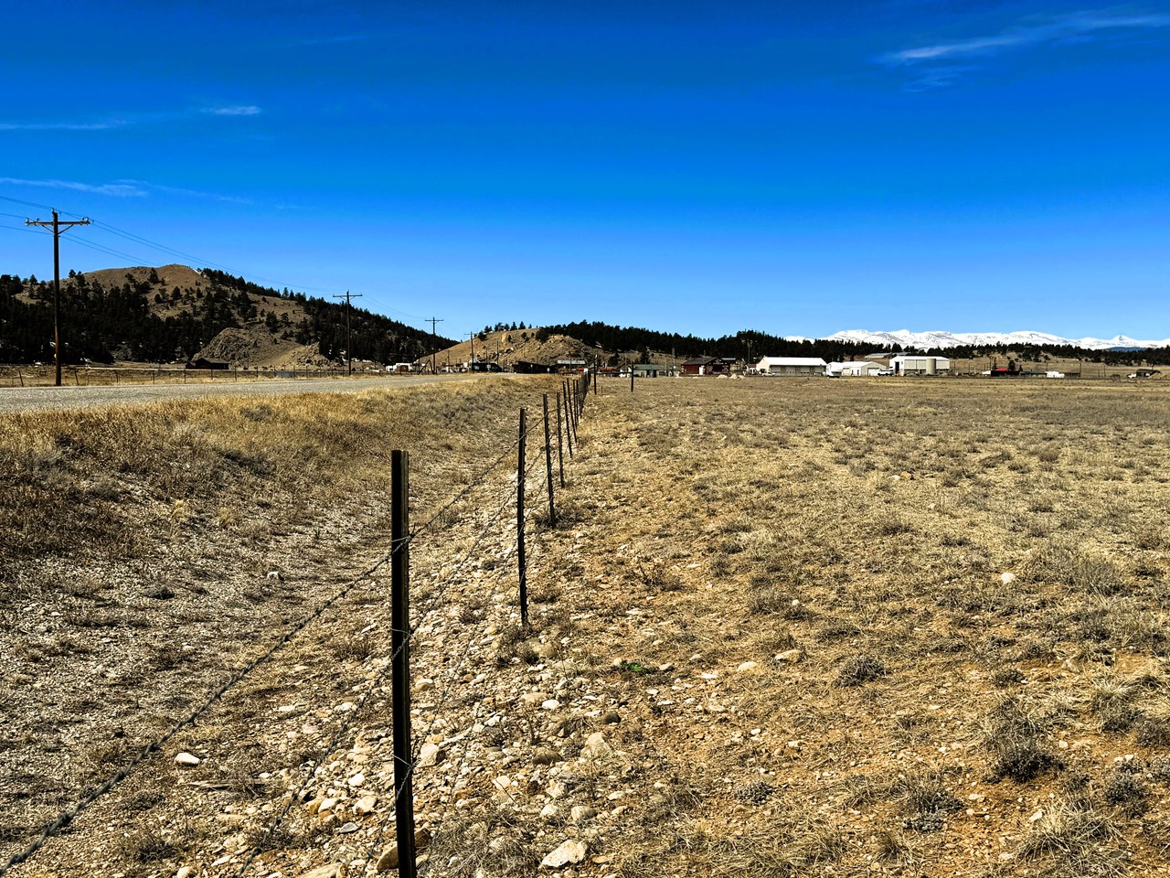 view west along the south property boundary and the fence line view west along the south property boundary and the fence line