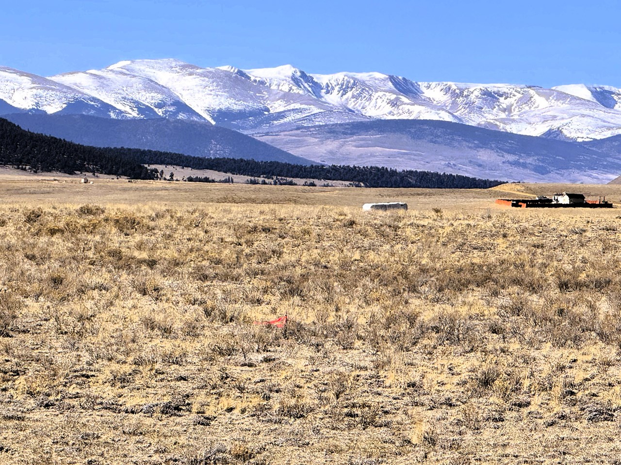 zoomed northwest from the property to snow capped mountain peaks zoomed northwest from the property to snow capped mountain peaks